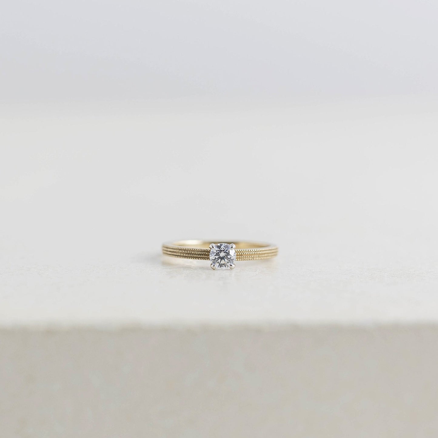京都と大阪のオーダーメイド結婚指輪、アトリエタマリ。一粒ダイヤの婚約指輪、トゥジュールエンゲージリング。