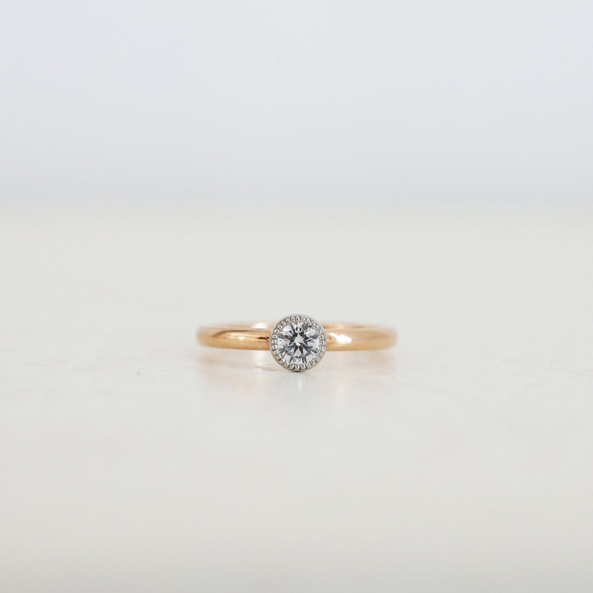 京都と大阪のオーダーメイド結婚指輪、アトリエタマリ。一粒ダイヤの婚約指輪、デザインドロップ。