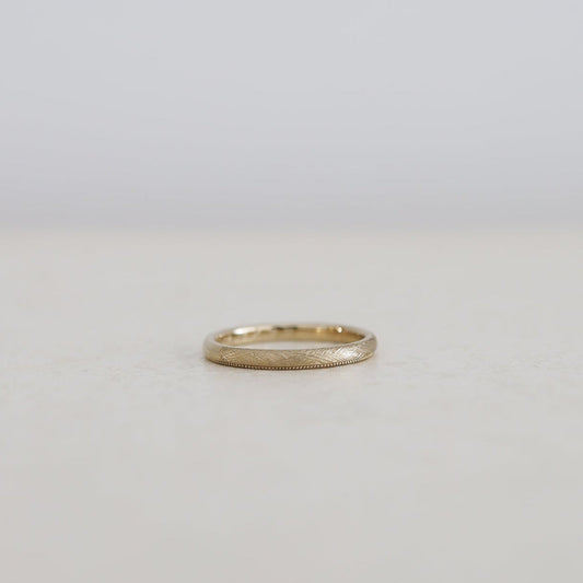 リネン加工に片側にミルグレインを入れた結婚指輪/atelier tamari